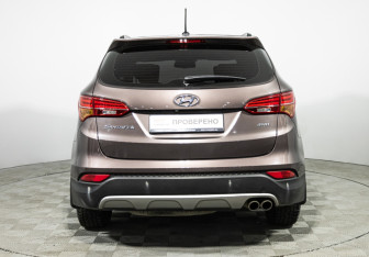 Подержанный автомобиль Hyundai Santa Fe 2014 года (6 фото)
