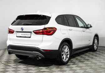 Подержанный автомобиль BMW X1 2015 года (5 фото)