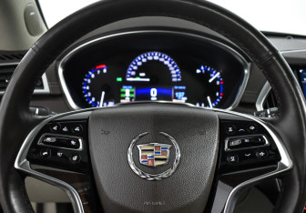 Подержанный автомобиль Cadillac SRX 2014 года (18 фото)