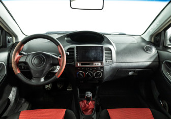 Подержанный автомобиль Geely MK Cross 2013 года (13 фото)