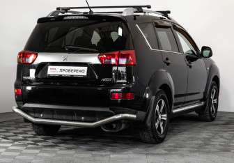 Подержанный автомобиль Peugeot 4007 2008 года (5 фото)