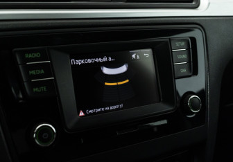 Подержанный автомобиль Skoda Rapid Liftback 2016 года (15 фото)