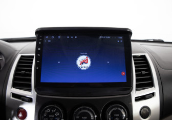 Подержанный автомобиль Mitsubishi Pajero Sport 2010 года (18 фото)