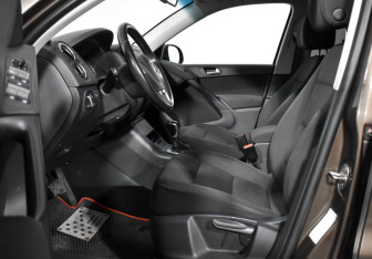 Подержанный автомобиль Volkswagen Tiguan 2015 года (10 фото)