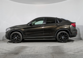 Подержанный автомобиль BMW X6 2015 года (8 фото)