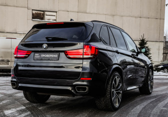 Подержанный автомобиль BMW X5 2016 года (7 фото)