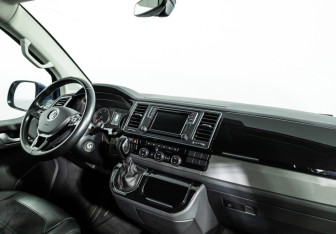 Подержанный автомобиль Volkswagen Multivan 2016 года (9 фото)