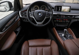 Подержанный автомобиль BMW X6 2017 года (13 фото)