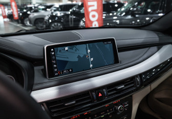 Подержанный автомобиль BMW X6 2018 года (21 фото)
