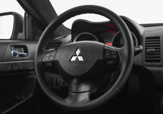 Подержанный автомобиль Mitsubishi Lancer Sedan 2008 года (14 фото)