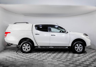 Подержанный автомобиль Mitsubishi L200 2015 года (4 фото)