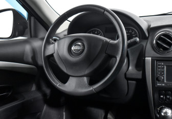 Подержанный автомобиль Nissan Almera Sedan 2014 года (13 фото)