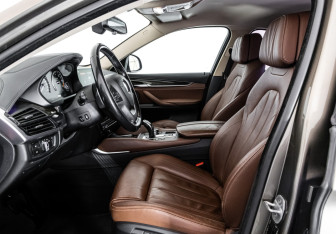 Подержанный автомобиль BMW X6 2017 года (24 фото)