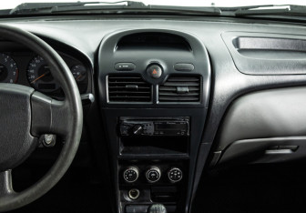 Подержанный автомобиль Nissan Almera Classic 2009 года (14 фото)