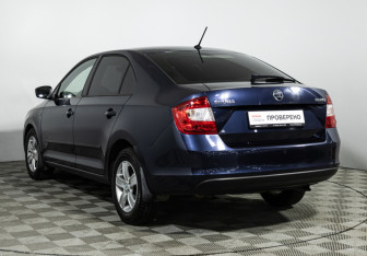 Подержанный автомобиль Skoda Rapid Liftback 2015 года (7 фото)