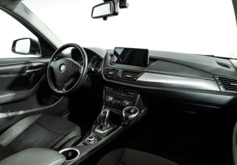 Подержанный автомобиль BMW X1 2013 года (9 фото)