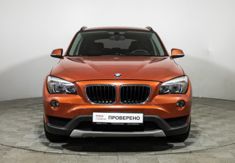 Подержанный автомобиль BMW X1 2013 года (2 фото)