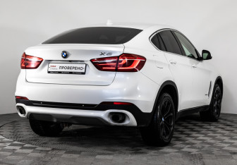 Подержанный автомобиль BMW X6 2015 года (5 фото)