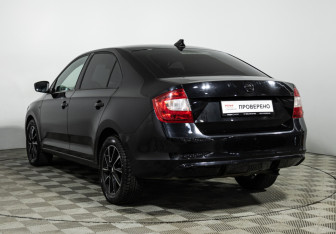 Подержанный автомобиль Skoda Rapid Liftback 2015 года (7 фото)