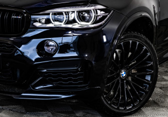 Подержанный автомобиль BMW X6 2015 года (3 фото)