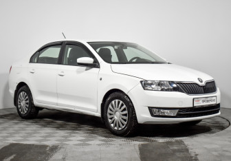 Подержанный автомобиль Skoda Rapid Liftback 2014 года (3 фото)