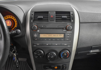 Подержанный автомобиль Toyota Corolla Sedan 2007 года (15 фото)