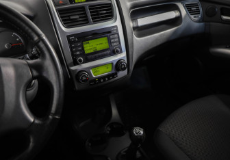 Подержанный автомобиль Kia Sportage 2010 года (17 фото)