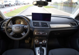 Подержанный автомобиль Audi Q3 2014 года (10 фото)
