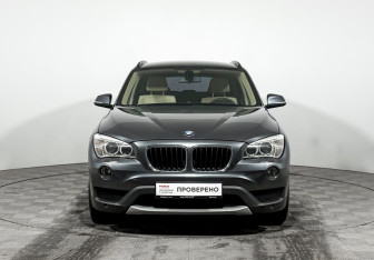 Подержанный автомобиль BMW X1 2013 года (2 фото)