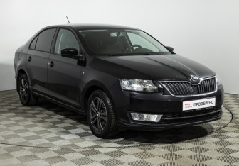 Подержанный автомобиль Skoda Rapid Liftback 2014 года (3 фото)