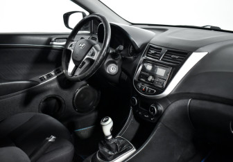 Подержанный автомобиль Hyundai Solaris Sedan 2015 года (13 фото)