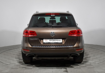 Подержанный автомобиль Volkswagen Touareg 2014 года (6 фото)
