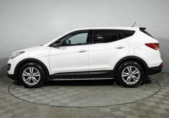 Подержанный автомобиль Hyundai Santa Fe 2014 года (8 фото)