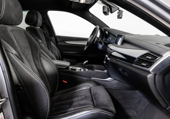 Подержанный автомобиль BMW X6 2018 года (26 фото)