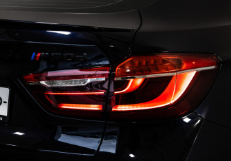 Подержанный автомобиль BMW X6 2015 года (12 фото)