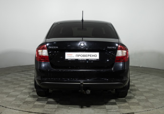 Подержанный автомобиль Skoda Rapid Liftback 2014 года (6 фото)