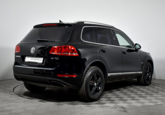 Подержанный автомобиль Volkswagen Touareg 2011 года (5 фото)