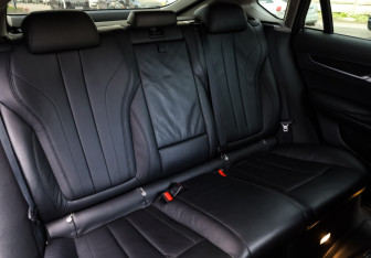 Подержанный автомобиль BMW X6 2016 года (17 фото)