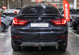 Подержанный автомобиль BMW X6 2016 года (10 фото)