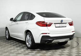 Подержанный автомобиль BMW X4 2015 года (7 фото)
