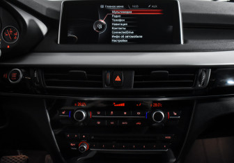 Подержанный автомобиль BMW X5 2015 года (16 фото)