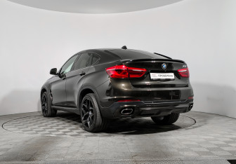 Подержанный автомобиль BMW X6 2015 года (7 фото)