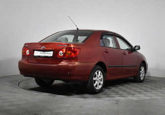 Подержанный автомобиль Toyota Corolla Sedan 2002 года (5 фото)