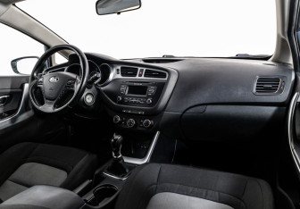 Подержанный автомобиль Kia Ceed Hatchback 2013 года (9 фото)
