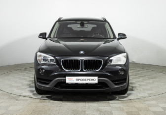 Подержанный автомобиль BMW X1 2013 года (2 фото)