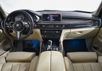 Подержанный автомобиль BMW X5 2014 года (14 фото)