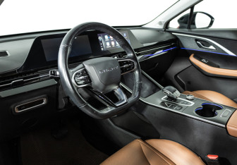Подержанный автомобиль Omoda C5 2022 года (11 фото)