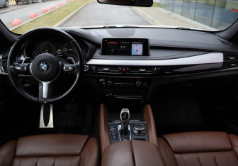 Подержанный автомобиль BMW X6 2018 года (8 фото)