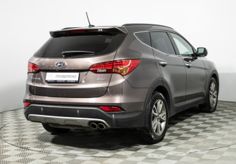 Подержанный автомобиль Hyundai Santa Fe 2014 года (5 фото)