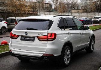 Подержанный автомобиль BMW X5 2014 года (4 фото)